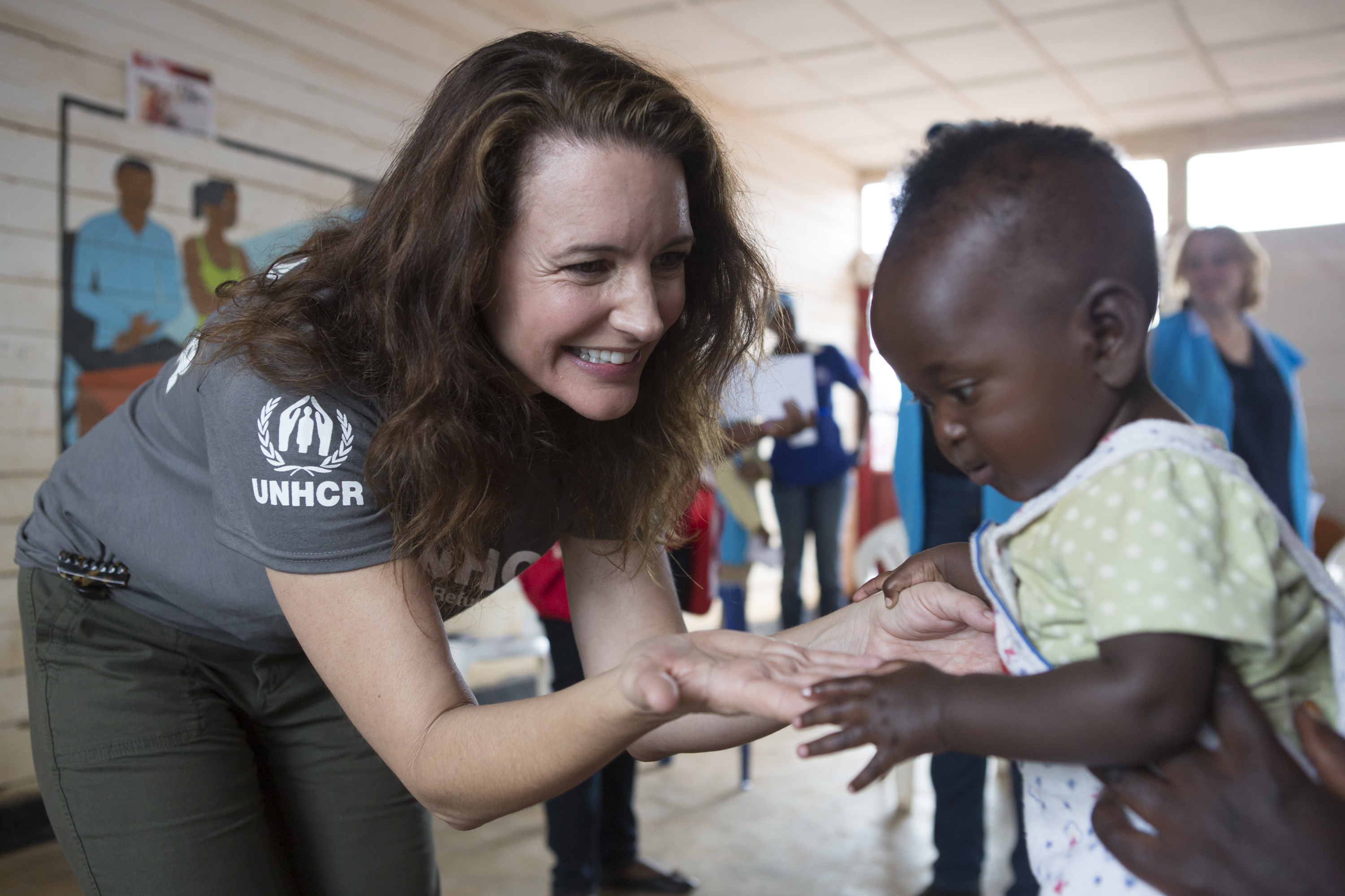 UNHCR Goodwill Ambassador Kristin Davis meets a women